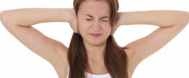 أعراض طنين الأذن وعلاجه